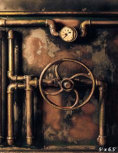 an old metal box with pipes and a clock on the wall above it that is rusted