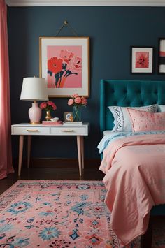 a bedroom with blue walls and pink bedding in the corner, framed artwork on the wall