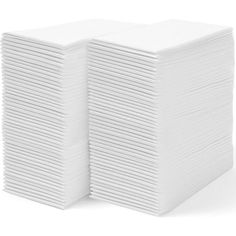 a stack of white paper towels stacked on top of each other in front of a white background