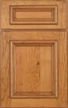 a wooden cabinet door with two drawers