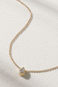 We've come to expect elegant yet minimal pieces from Mateo and this necklace is a perfect example. It's cast from 14-karat gold and strung with a sparkling pear-cut diamond. Wear yours with décolletage-baring necklines and keep the rest of your jewelry simple. Pearl And Diamond Necklace, Gold Necklace Simple, Pear Cut Diamond, Jewelry Simple, Gold Diamond Necklace, Minimal Jewelry, Green Necklace, Simple Jewelry, Fine Jewellery Necklace