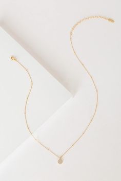 Dainty Gold Rhinestone Necklace With Adjustable Chain, Dainty Gold Rhinestone Necklace With Delicate Chain, Gold Rhinestone Necklace With Delicate Chain As Gift, Gold Dainty Drop Necklace With Cubic Zirconia, Gold Minimalist Diamond Teardrop Pendant Necklace, Gold Minimalist Diamond Necklace With Teardrop Pendant, Gold Minimalist Teardrop Diamond Necklace, Gold Teardrop Pendant Necklace For Mother's Day, Dainty Gold Teardrop Pendant Diamond Necklace