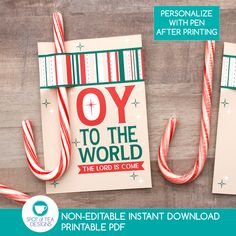 a christmas card with candy canes on it and the words joy to the world