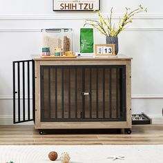 a wooden cabinet sitting on top of a hard wood floor next to a white rug