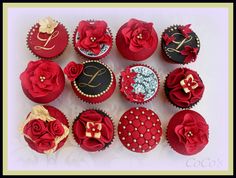 cupcakes decorated with red roses and gold accents are arranged in a square pattern