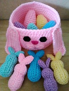 a crocheted pink bunny with five little bunnies