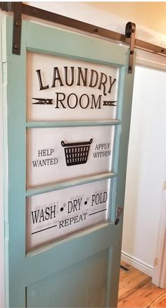 the laundry room sign is hanging on the door to reveal what's in the washroom