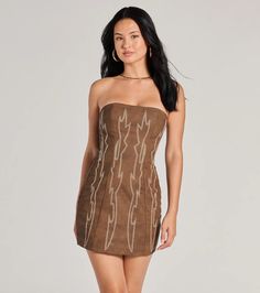 A faux leather mini dress features a flattering strapless neckline, a bodycon fit, and a cutout back with a lace-up design that turns heads at the rodeo. The dress is composed of a faux leather-lined fabric with western-inspired stitching.Fit & FeaturesWestern-inspired stitchingFaux leather fabric, sewn-in knit liningStraplessCutout back, lace-up design, lower zipper and hook-eye closureBodycon mini-length silhouetteRuns true to size Prom Accessories, Homecoming Dresses Long, Prom Shopping, Cocktail Outfit, Windsor Dresses, Leather Mini Dress, Homecoming Dresses Short, Prom Outfits, Going Out Dresses