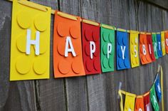 a happy birthday banner made out of lego blocks