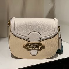 Coach Jade Colorblock Leather Saddle Bag Handbag Cream Nwt $350 Refined Pebble Leather, Buffalo-Embossed Leather And Smooth Leather Inside Multifunction Pockets Magnetic Snap Closure, Fabric Lining Outside Slip Pocket Detachable Strap With 20 3/4" Drop For Shoulder Or Crossbody Wear 8 1/4" (L) X 6 3/4" (H) X 2 3/4" (W) Style No. 91164 Coach Belt Bag, Coach Mini Purse, Plaid Purse, Leather Saddle Bags, Leather Fanny Pack, Mini Handbags, Mini Shoulder Bag, Mini Purse, Coach Leather