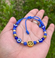 Adjustable to wrist Gold Evil Eye Bracelet With Letter And Round Beads, Festival Evil Eye Bracelet With Colorful Round Beads, Evil Eye Bead Bracelet Gift, Adjustable Spiritual Evil Eye Bracelet With Colorful Beads, Spiritual Adjustable Evil Eye Bracelet With Colorful Beads, Bohemian Beaded Bracelets For Jewelry Making With Evil Eye, Bohemian Beaded Evil Eye Bracelets For Jewelry Making, Bohemian Evil Eye Beaded Bracelets For Jewelry Making, Blue Beaded Bracelets With Evil Eye