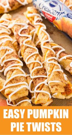 easy pumpkin pie twists with white icing on top and in the background, there is a bag of candy