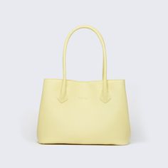 Material: Pebbled genuine cow leather. Interior: Lined with canvas Color: Yellow Height: 26.7 cm 10.5 inch Length: 43.18 cm 17 inch Depth: 15.2 cm 6 inch Weight: 0.95 Kg 2.09 Lb. Spring Leather Shoulder Bag For Daily Use, Classic Leather Shoulder Bag For Spring, Classic Yellow Textured Leather Bag, Classic Leather Satchel With Pebbled Texture, Textured Leather Bags For Everyday Use In Spring, Yellow Leather Bag For Work, Classic Leather Bags For Spring, Daily Use Textured Leather Coated Canvas Satchel, Daily Use Textured Leather Satchel