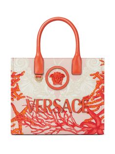 orange/beige cotton canvas leather trim all-over graphic print gold-tone hardware Medusa Head motif logo patch to the front two rolled top handles strap and press-stud fastening main compartment internal logo stamp internal zip-fastening pocket This piece comes complete with a protective dust bag. Versace Pink, Versace Handbags, Versace Gold, Medusa Head, Versace Bags, Small Tote Bag, Raffia Bag, Small Canvas, Printed Canvas