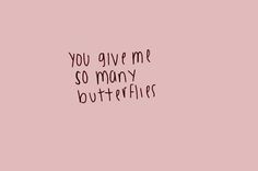 a pink wall with the words you give me so many butterflies