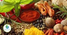 an assortment of spices and herbs on a table