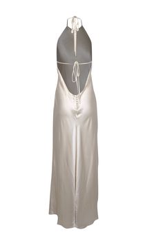 Get ready to turn heads in this Reformation ivory silk halter formal dress! Made from luxurious silk, this maxi dress features a sexy halter neckline and an open back that will make you feel sleek and confident. Complete the look with gold strappy heels and a jeweled clutch. Size XL Shell 100% Silk Lining 100% Viscose Button back closure Open back Halter neck tie Bust 44" Waist 36" Shoulder to hem 67" Chic Tie Back Maxi Gown, Elegant Floor-length Dress With Lace-up Back, Summer Floor-length Gown With Back Opening, Evening Lace-up Back Floor-length Maxi Dress, Evening Floor-length Maxi Dress With Lace-up Back, Elegant Fitted Halter Dress With Low Back, Chic Backless Satin Maxi Dress, Summer Maxi Gown With Tie Back, Elegant Floor-length Gown With Lace-up Back