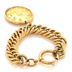 This is an authentic CHANEL 31 Rue Cambon Paris Medallion Chain Bracelet in Gold. This stylish bracelet is crafted of gold chain links with a large Chanel CC medallion pendant. 31 Rue Cambon, Stylish Bracelet, Chain Links, Gold Bracelet Chain, Bracelet Gold, Chain Bracelet, Chain Link, Gold Chain, Gold Chains