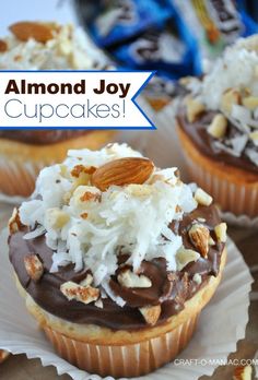 almond joy cupcakes topped with chocolate frosting and coconut flakes on a plate