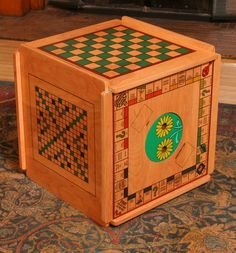 a wooden box sitting on top of a rug