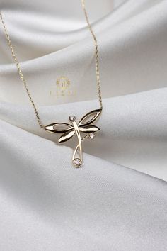 "ABOUT PRODUCT This 14K Gold Dragonfly Pendant necklace is beautifully designed and hand crafted with our associates to make this a special gift for your loved ones. Knowing the value of our customers, We prepare each piece with extra care and attention.  ITEM DETAILS Material: 14K Gold Approx:  2.35 gram Available colors: Gold, Rose Gold, White Gold Available Sizes: 14\" to 20\" ✪ 14k Solid Gold ( Certification will be included with your order ) ✪Available 14K White, Yellow, Rose Gold (also in Symbol Of Strength, Cute Gifts For Her, Zierlicher Ring, Dragonfly Charm, Stacked Necklaces, Dragonfly Necklace, Pendant Necklace Gold, Solid Gold Necklace, Dragonfly Pendant