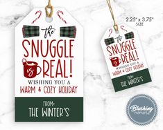 two tags with the words snuggle deal and an image of santa's sleigh