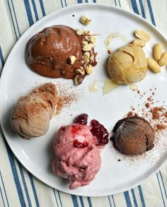 a white plate topped with different types of ice cream