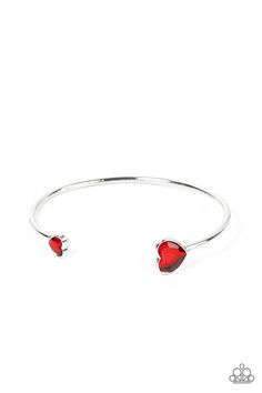 Enhanced with glitzy red rhinestones, two silver hearts adorn the ends of a silver band that curls around the wrist for a flirtatious open-faced style cuff.

 Sold as one individual bracelet. Red Bracelet, Rose Gold Beads, Unrequited Love, Red Bracelets, Heart Frame, Paparazzi Accessories, Rhinestone Heart, White Rhinestone, Red Rhinestone