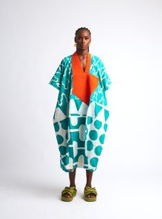 Our signature Agbada has been refreshed in this sea green and white graphic print and finished with orange hand woven aso oke collar. This versatile yet sophisticated loungewear in this staple color and bold print is your new wardrobe staple. Made fro... Latest Bubu Gown Style, Dye Lab, African Kaftan Dress, Dress With Kimono, Bubu Gown Styles, Red And Black Shirt, 2piece Outfits, Aso Oke, Dress Shirt Sleeves