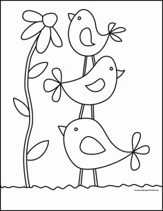 two birds are standing on top of each other in front of a tree with flowers