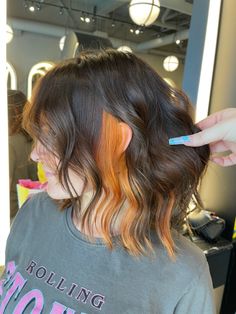 Dip Dye Short Hair Brunette, Orange And Brunette Hair, Peekaboo Hair Ideas For Brunettes, Dark Brown Hair With Burgundy Peekaboo, Dark Hair With Orange Underneath, Color Blocking Short Hair, Peek A Boo Copper Hair, Brown Hair With Orange Peekaboo