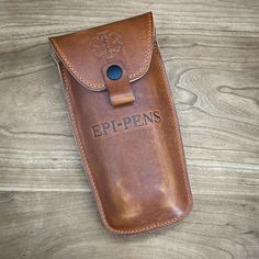 Customize your own luxury Epi Pen case.  Select your favorite Horween leather, accent stitching and heatstamped personalization. Handmade to order by CustomLeatherAndPen in Houston, TX.   Available in both single and dual EpiPen sizes.  Protect yourself and loved ones with an easy access, beautifully handmade case in American Horween leather.    Available with belt loop or swivel clip.  Swivel Clip is standard.   Handmade in Houston, TX from Horween leather the premiere leather tannery in the USA since 1905.   Please note that Horween is aniline is the most natural, soft and gracefully supple of all leather tanning methods. With minimal processing, aniline hides proudly display the hallmarks of genuine leather such as fat wrinkles, growth marks, healed scars, insect bites and scratches.  A Epi Pen Case, Whiskey Lover Gifts, Utility Belt, Horween Leather, Toiletry Kit, Monogram Fonts, Travel Case, Leather Case, Gift For Lover