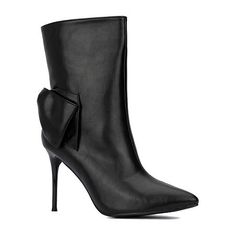 The Mila pointed toe ankle bootie features oversized bow accents on the sides, stiletto heels, and exposed zip closure at sides.Closure Type: Side ZipperShaft Circumference: 13 InchesBoot Shaft Height: 6 1/2 InchesShoe Heel Height: 3 1/2 InchesUpper/Outer Base Material: 100% PolyuretheneShoe Lining Material: TextileSole Material Content: 100% Thermoplastic-RubberCalf Width: RegularToe Type: Pointed Toe, Closed ToeHeel Style: Stiletto HeelCountry of Origin: Imported Womens High Heel Boots, Bow High Heels, Heeled Chelsea Boots, New York And Company, Black Chelsea Boots, Shoe Carnival, Leather Bows, Ankle Bootie, Womens Boots Ankle