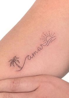 a woman's arm with a small tattoo on it that says, lanana