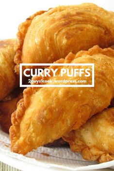 some fried food on a plate with the words curry puffs