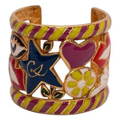 Christian Lacroix (Made in France) Cuff bracelet made of enamelled gilted metal. Additional information: Dimensions: Circumference: 14 cm (5.51 in) Height: 5.2 cm (2.05 in) Openning: 3.5 cm (1.38 in) Condition: Very good condition Seller Ref number: BRA45 Christian Lacroix, Amazing Jewelry, Bracelet Making, Made In France, Cuff Bracelet, Givenchy, Metallica, Cuff Bracelets, Fendi