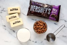 ingredients to make chocolate peanut butter bars laid out on a marble counter