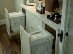 an image of a room setting with laundry items on the counter and washer in the corner