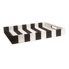 a black and white striped tray with handles