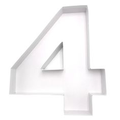 the number four is made out of white cardboard and sits in front of a white background