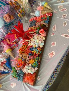 there are many candy items on the table