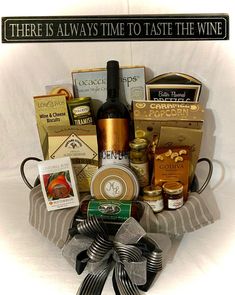 a wine gift basket filled with various items