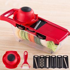 a red vegetable slicer with six different attachments