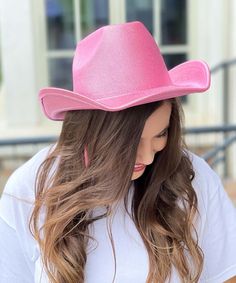 Introducing our "Long Live Cowgirls Hat" in Pink, the ultimate accessory for every cowgirl and country concert enthusiast! Crafted with iridescent glitter, this cowboy hat adds a touch of sparkle and flair to your western-inspired ensemble.
Whether you're two-stepping at a country concert, line dancing at a western-themed party, or simply embracing your cowgirl spirit, this hat is sure to make you stand out in the crowd. The vibrant Pink color adds a playful and feminine touch, perfect for adding a pop of color to your outfit.
With its classic cowboy hat design and shimmering glitter finish, our "Long Live Cowgirls Hat" is the perfect way to show off your country girl pride in style. Pair it with denim shorts and boots for a chic and effortless look that's ready for the dance floor.
So why Western One Size Costume Hats For Rodeo, Western Style Costume Hats For Rodeo, Pink Western Hat For Ranch, Western Costume Hats For Western-themed Events, Western Costume Hats For Themed Events, Western-styled Costume Hats For Western-themed Events, Western-themed Costume Hats And Headpieces, Wide Brim Costume Hats For Country Events, Pink Western Felt Hat For Rodeo