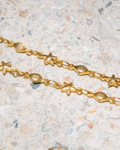 The Starry Seas Necklace is a stack that is sure to elevate your beachy look! This 24k gold plated star chain is perfect for swimming in the ocean sunrise to sunset! 16” Necklace City Beach, Swimming In The Ocean, Ocean Sunrise, Free People Swim, Sea Necklace, Paris Jewelry, Swimwear Store, Coconut Grove, Star Chain