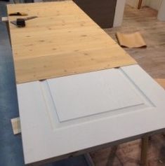 an unfinished kitchen counter top being installed