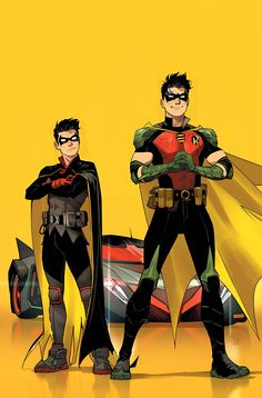 batman and robin wayne standing next to each other