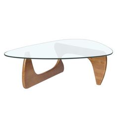 an oval glass table with wooden legs and a curved base, on a white background