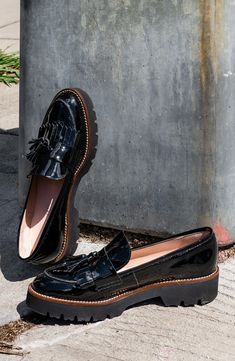 A lug sole lends an extra-toothy bite to a street-savvy leather loafer with a classic tassel detail on the fringed vamp. 1" heel Removable, cushioned insole with arch support Leather upper and lining/rubber sole Made in Spain Patent Leather Tassel Loafers With Round Toe For Work, Trendy Tassel Loafers With Round Toe For Fall, Trendy Leather Tassel Loafers With Round Toe, Trendy Leather Tassel Loafers For Fall, Fall Tassel Loafers With Rubber Sole And Almond Toe, Fall Tassel Loafers With Rubber Sole, Luxury Black Patent Leather Tassel Loafers, Green Leather Slip-on Tassel Loafers, Black Slip-on Tassel Loafers With Textured Sole