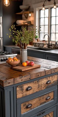 a kitchen island with fruit on it in front of an oven